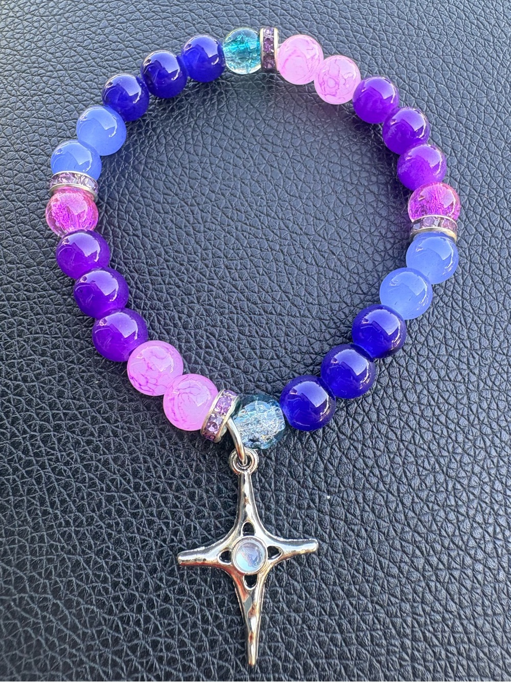 Purples and blue glass beaded bracelet with silver accent and North Star charm